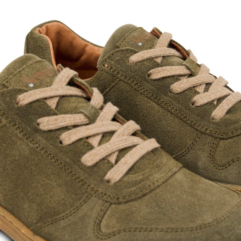 Koel Barefoot Francie suede eco sneakers in olive, showcasing a comfortable and stylish design for casual wear.