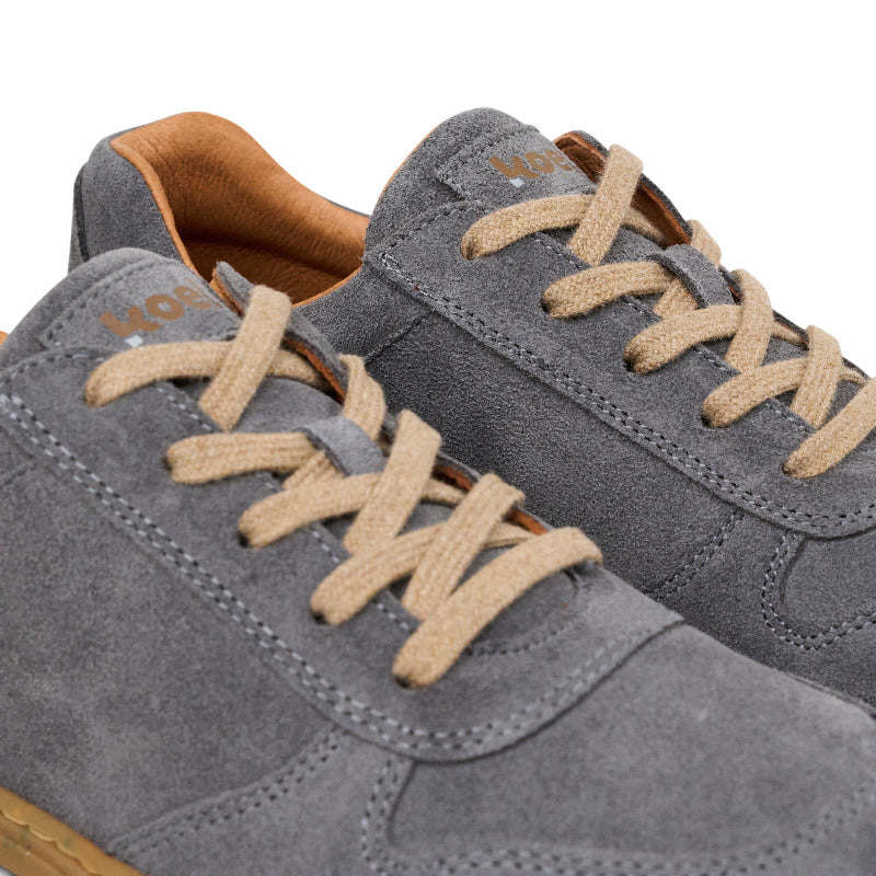 Koel Barefoot Francie grey suede eco-friendly sneakers with a minimalist design and flexible sole for comfortable wear.