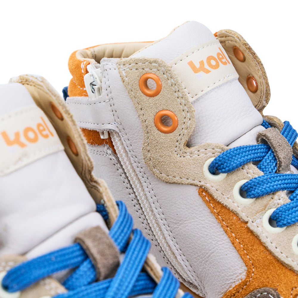 Koel orange Danish nappa barefoot sneakers with zipper, showcasing a stylish and comfortable design for everyday wear.