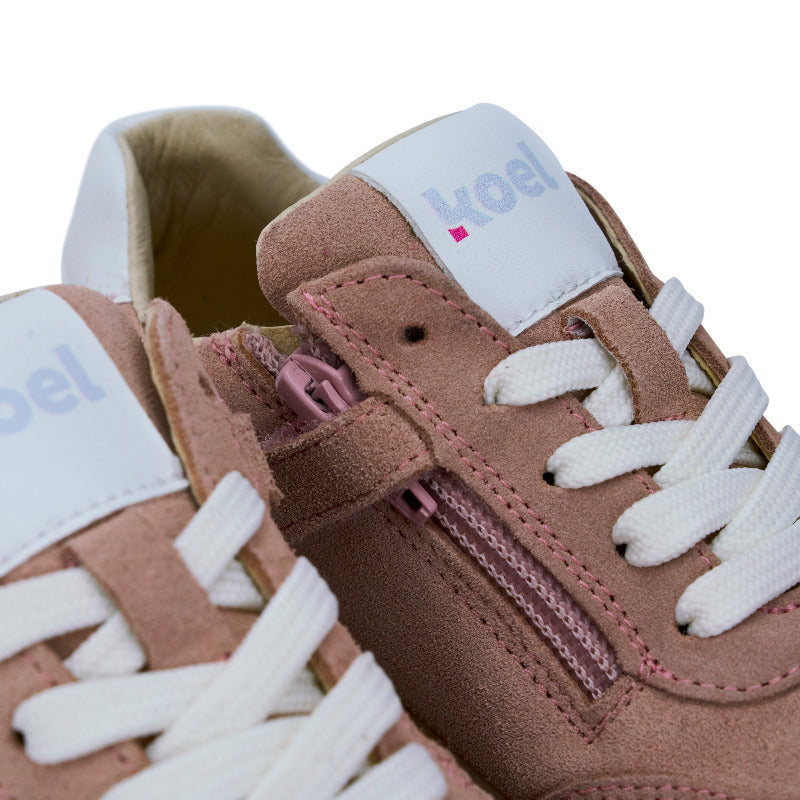 Koel Barefoot Declan suede sneakers in soft pink with laces and zipper, showcasing the shoe's design and texture.
