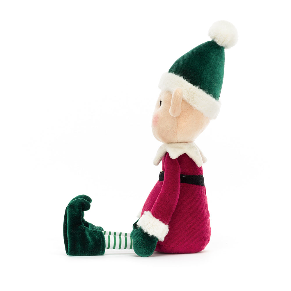 Jellycat Eldo Elf Plüschfigur. Weihnachtself mit heller Haut, rosanen Bäckchen und  Weihnachtsoutfit, ideal als Begleiter für Kids und als Deko ür die Weihnachtszeit, jetzt online kaufen und offline im keks. Kinderschuhladen Bielefeld.