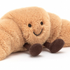 Kuscheliges Gebäck Croissant Kuscheltier  mit Füßchen von Jellycat , Ansicht von vorne