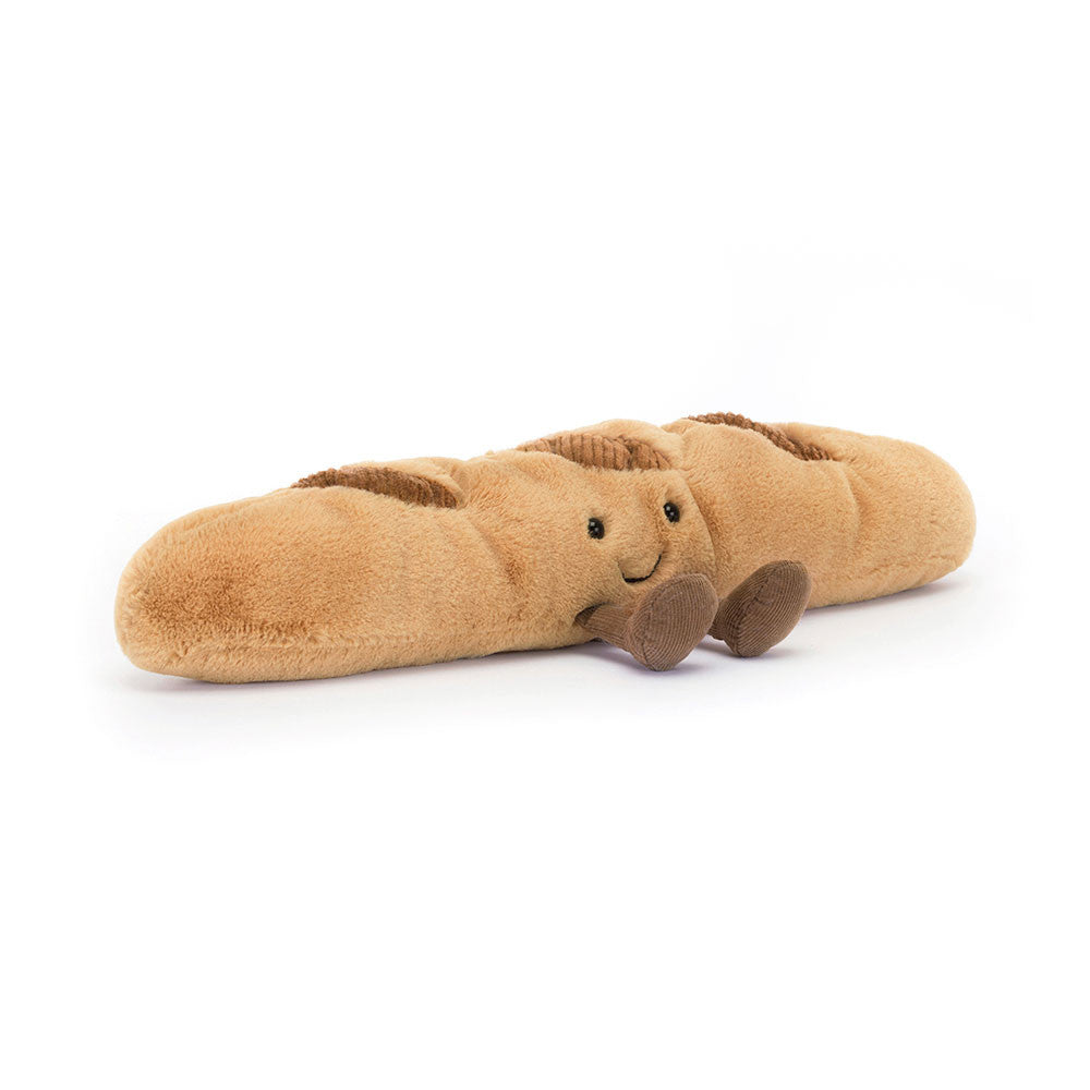 Jellycat Amuseables Baguette Kuscheltier aus hellbraunem Plüsch mit gesticktem Lächeln und schwarzen Kulleraugen, Frontansicht