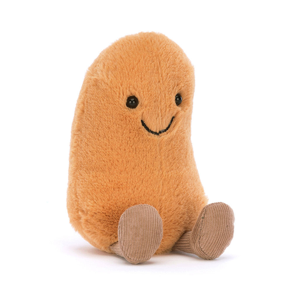Orange Jellycat Bohne zum Kuscheln mit aufgesticktem Lächeln, Kulleraugen und braunen Cord-Beinchen. schräge Vorderansicht