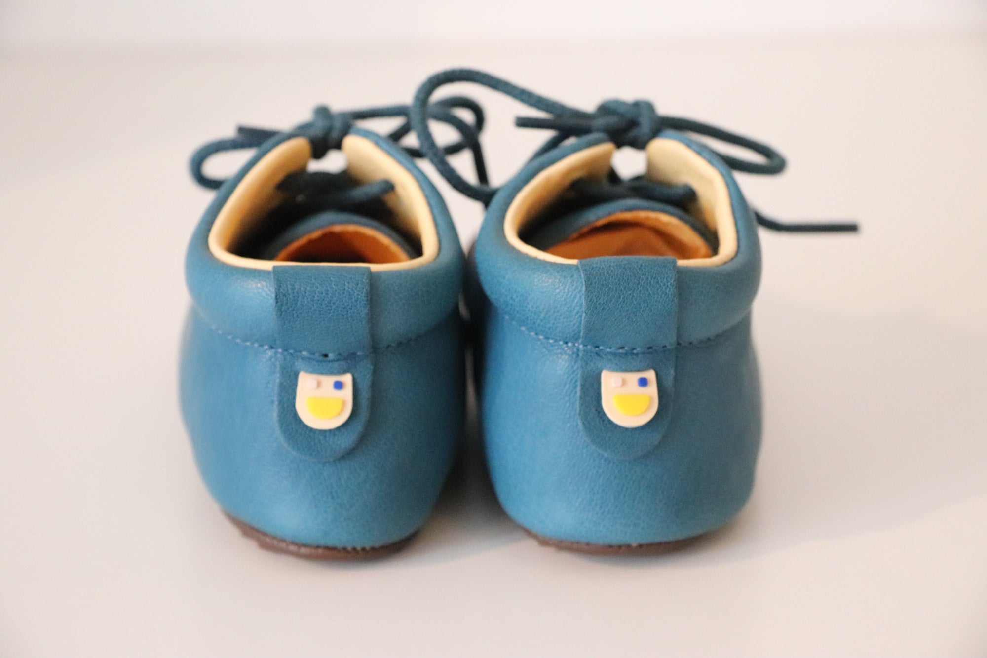 DULIS Babysneaker zum Schnüren mit Krabbelkappe PETROL - keks.